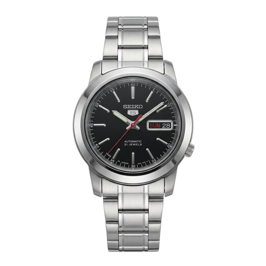 Reloj automático DEL MORAL | RELOJES Seiko 5 con dial negro, caja de acero inoxidable y correa de eslabones plateada.