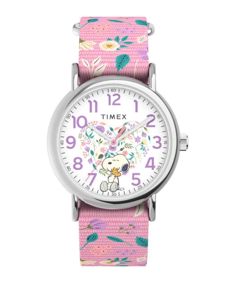 Reloj DEL MORAL | RELOJES Timex Weekender Peanuts con esfera blanca, Snoopy floral y correa de tela rosa estampada.