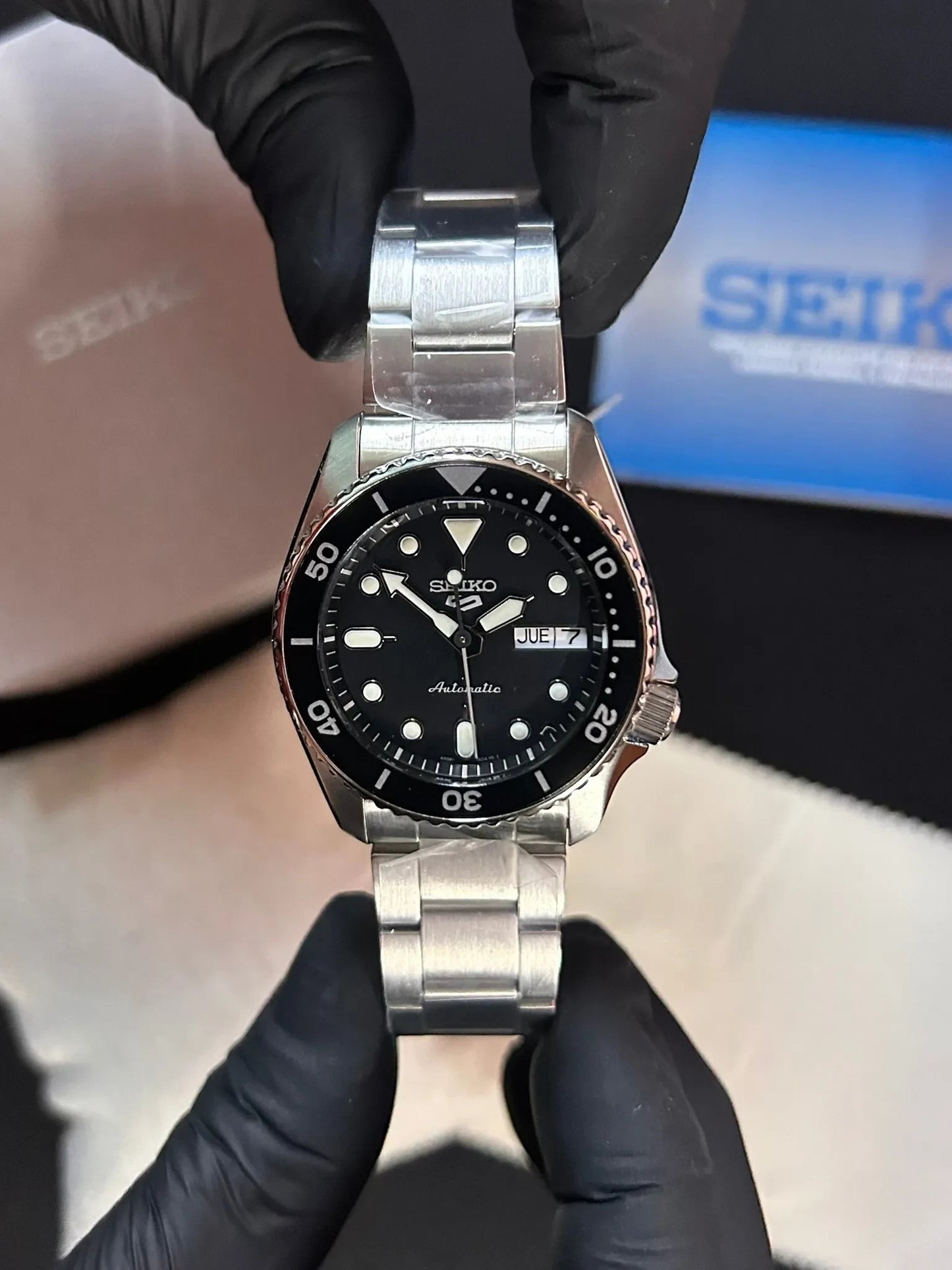 DEL MORAL | RELOJES Seiko 5 Sports SRPK29 reloj automático de acero inoxidable con esfera negra y bisel giratorio.