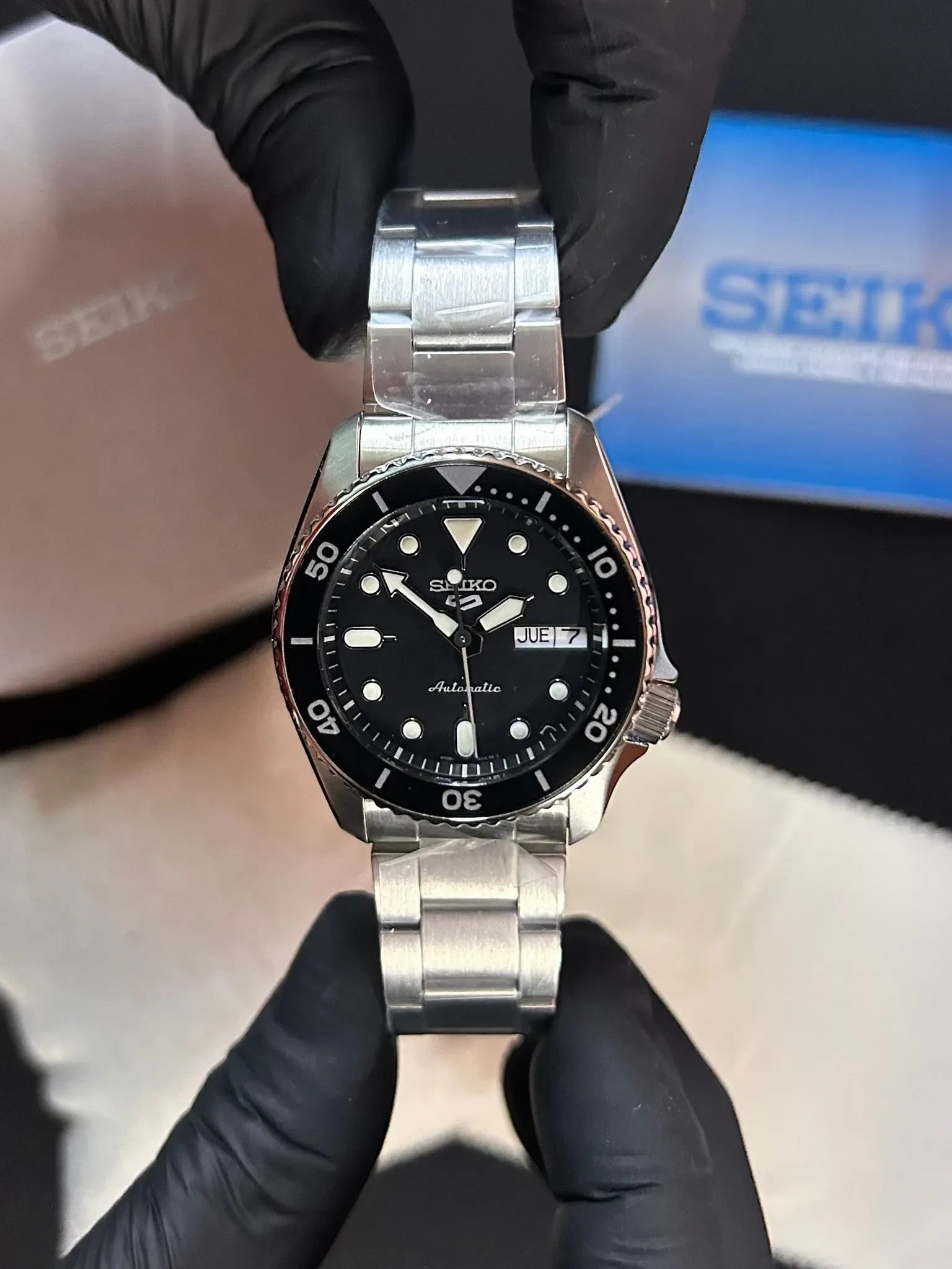 DEL MORAL | RELOJES Seiko 5 Sports SRPK29 reloj automático de acero inoxidable con esfera negra y bisel giratorio.